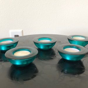 tea light candle holders with candles.